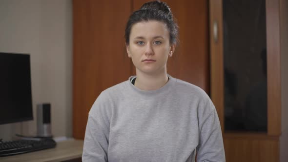 Portrait of Serious Woman Crossing Hands Gesturing No Shaking Head Looking at Camera