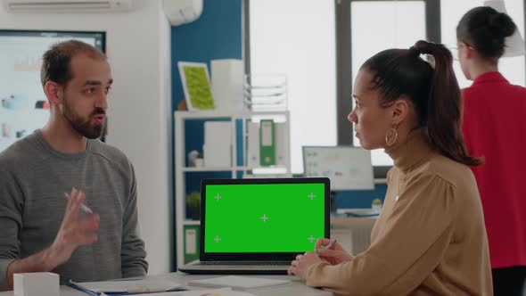 Business People Doing Teamwork on Laptop with Green Screen
