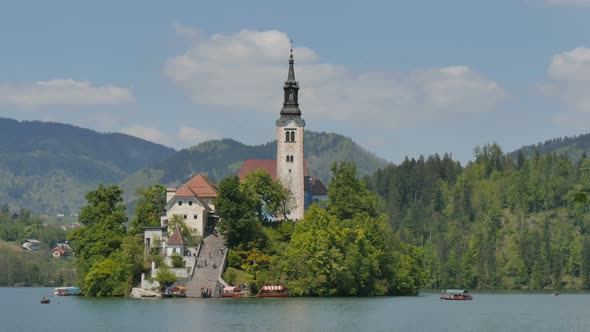 Famous Church on the Island of Bled Lake in Slovenia Alps  UHD Timelapse