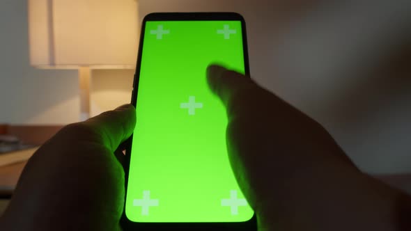 Man Point of View on a Phone with a Green Screen to Copy