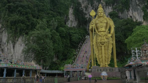 View of Entrance in Batu Caves, Stairway and the Murugan Gold Statue Against Mountain, Gombak