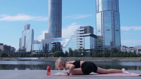 Woman working out in city