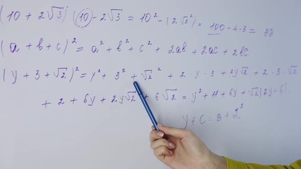 Woman's Hand Shows on Blackboard