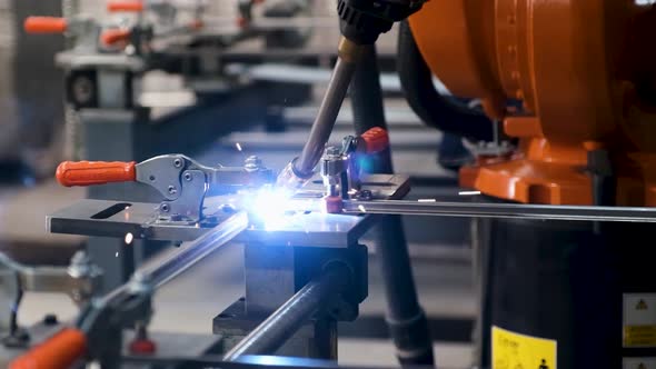 Welding Robots At Work