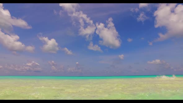 Aerial tourism of marine resort beach lifestyle by blue sea and white sandy background of a dayout n