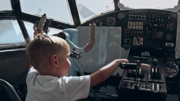 Small Kid on the Cabin of an Airplane