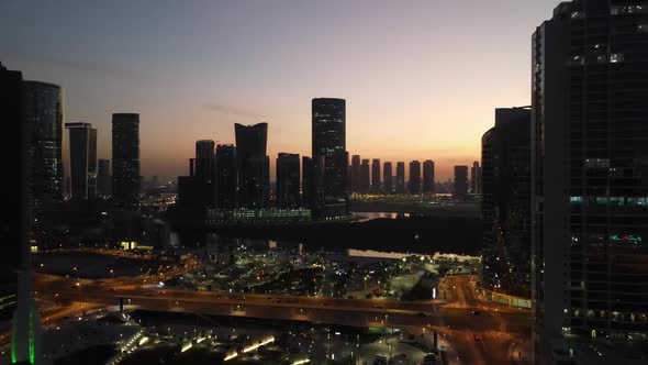 Sunset in Abu Dhabi Aerial View on Al Reem Island Surrounded By Modern Skyscrapers