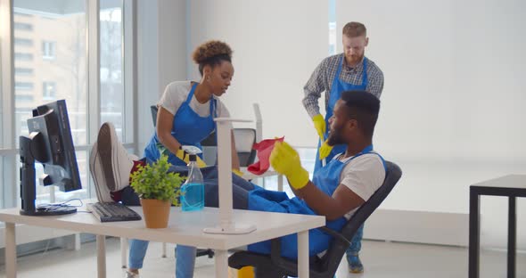 Lazy African Janitor Refusing To Help Team Cleaning Office