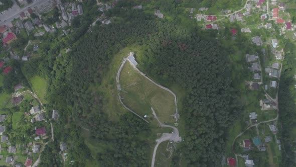Ruins on a hilltop seen from above alt
