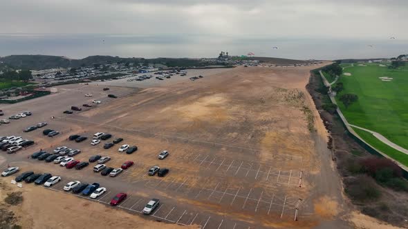 huge parking lot above hill by famous Torrey Pines golf course in La Jolla, California, USA. Aerial