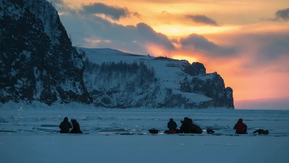 Group of Photographers Taking Pictures at Sunset Winter Time Timelapse