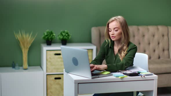 Busy Beautiful Female Work Using Notebook Confidently Looking at Screen