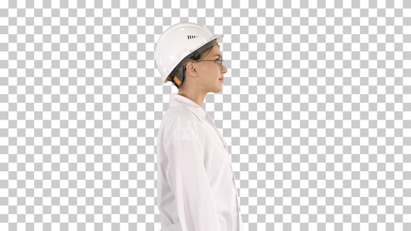 Scientist physicist woman walking in lab coat and hardhat Alpha