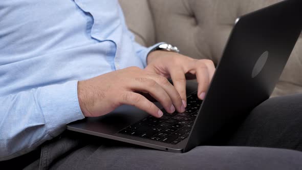Close Up Hand Man Stock Trader Broker Businessman Typing Text on Laptop Keyboard