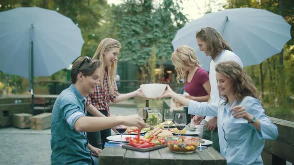 People Eating Healthy Food On Outdoor Party
