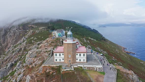 Drone Aerial Eis Top Notch fly above Finisterre Lighthouse in Fisterra, Galicia, North of Spain