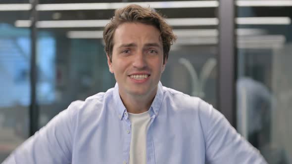 Portrait of Excited Man Celebrating Success