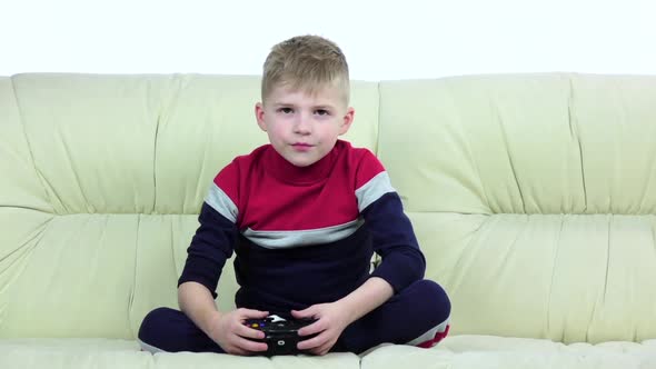 Kid Includes the Console and Starts Playing Online, Slow Motion alt