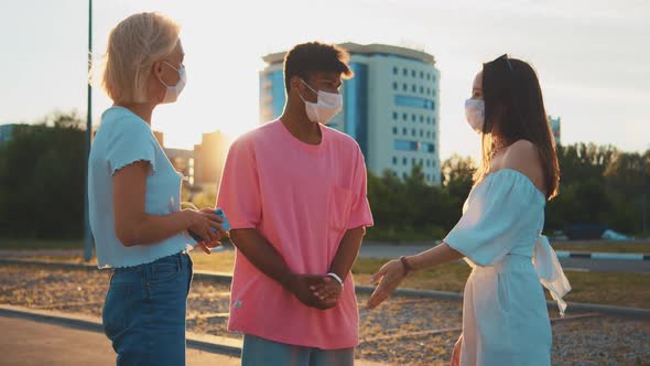 Beauty Multiracial Three Friends Talking in Protective Face Mask on Sunny Street Communicating Share