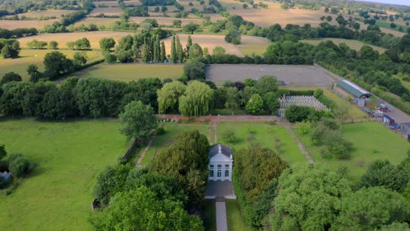Aerial View From the Drone on the on the Narrow Passageway Leading to a Small Chapel