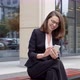 Business Woman Sitting on Bench Using Smartphone - VideoHive Item for Sale