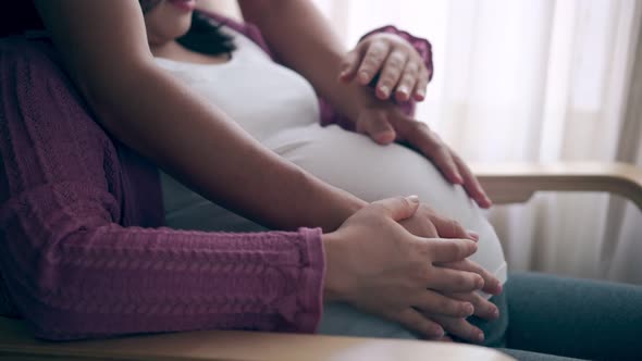 Pregnant Couple Feels Love and Relax at Home