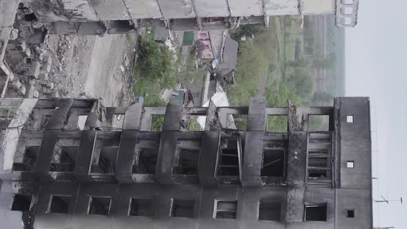 Vertical Video of the Consequences of the War in Ukraine  a Destroyed Building