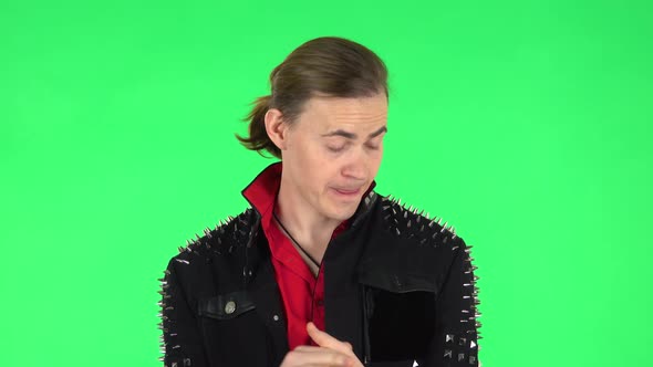 Man Claps His Hands with Dissatisfaction. Green Screen