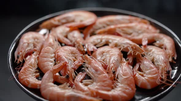 Boiled Big Sea Prawns or Shrimps Placed on Black Ceramic Plate