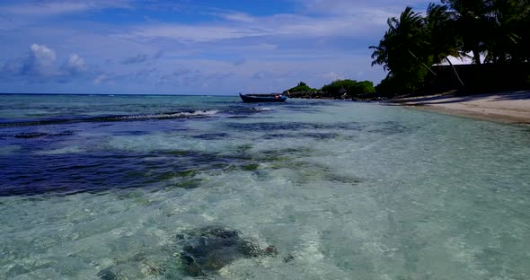 Natural overhead travel shot of a sunshine white sandy paradise beach and turquoise sea background i