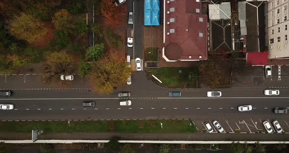 Top Down Drone Point of View - Steet City Road Intersection in Autumn Time