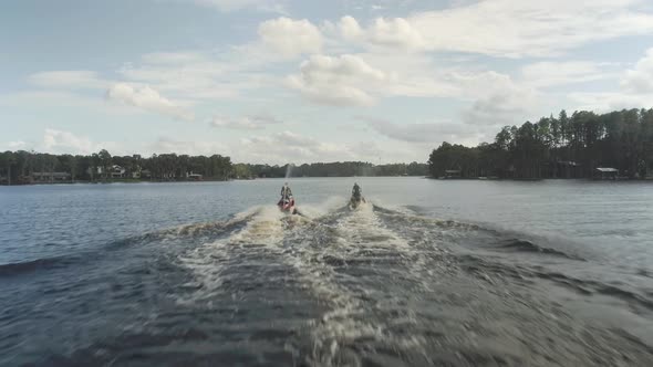 Two wave runners moving towards a cove