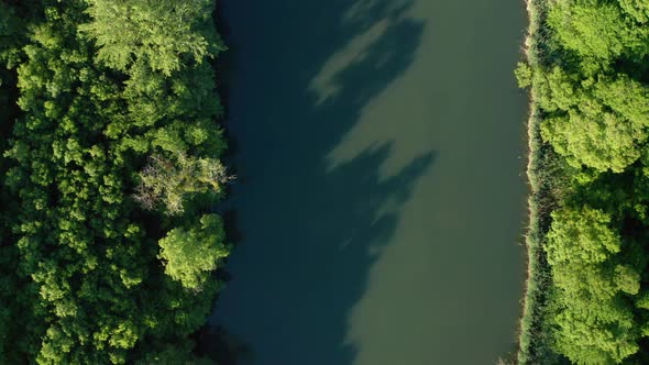 Drone flight above a wide river