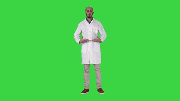 Arabian Doctor Talking To Camera on a Green Screen, Chroma Key