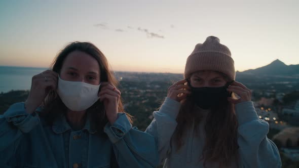 Portrait of Young Women Wearing Medical Masks