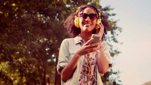 Pretty Hipster Using her Smartphone