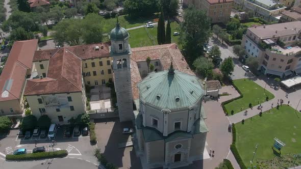 Beautiful drone view of a church in the center of Riva Del Garda, a small city in the region of Tren