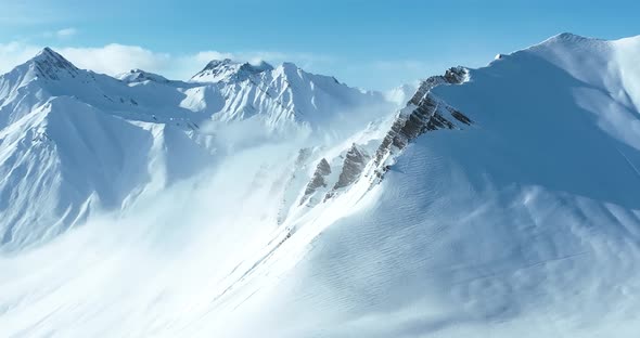 Aerial view of beautiful snowy mountains in Gudauri, Georgia