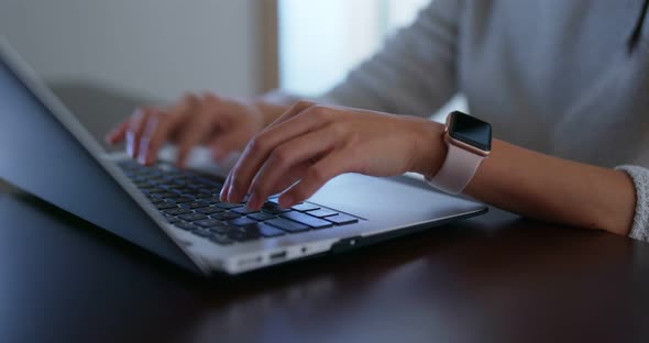 Woman work on computer at home