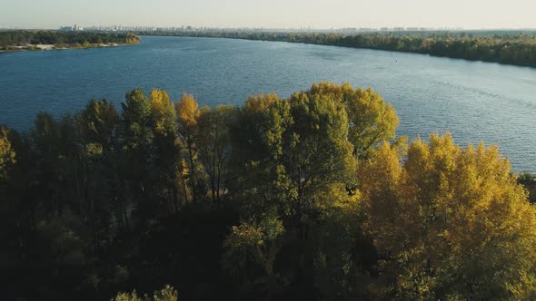 Flight Over Island on Dnipro River with View on Kyiv City at Autumn Season