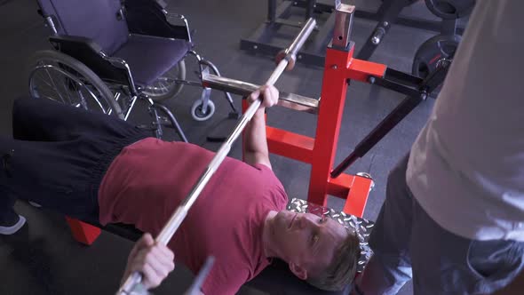 Man in a Wheelchair Working Out at the Gym