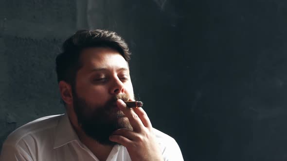 Man Smoking Cigar