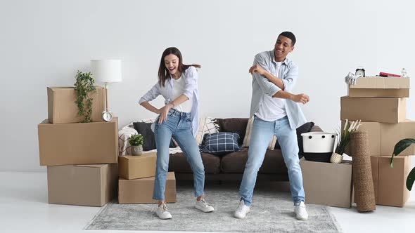 A Loving Young Couple Rejoices in Their New Home