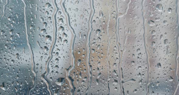 Water droplets on glass, rain outside