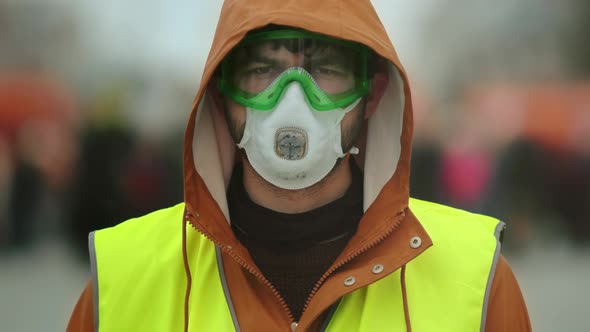 Portrait Man Yellow Vest. Gas Mask. Wearing a Gasmask. Political Strike Out