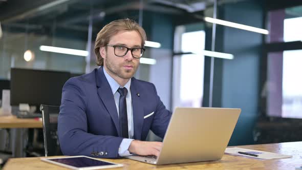 No By Disappointed Businessman at Work, Gesture By Finger