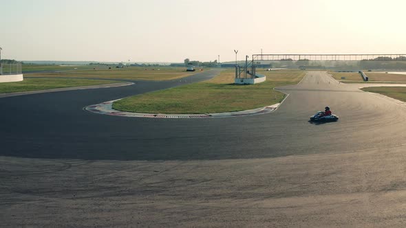 Racing Track with a Cart Being Driven Through It