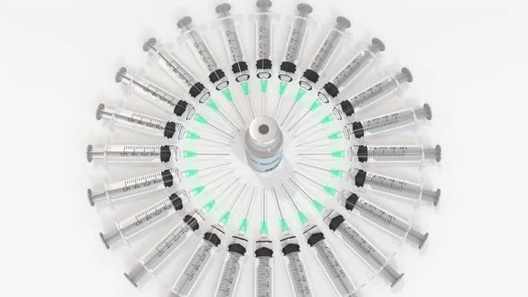 Bottle with HIV Vaccine and Syringes