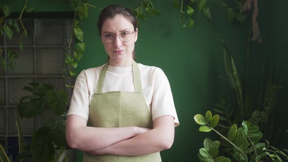 Portrait of a Female Florist Entrepreneur in an Apron