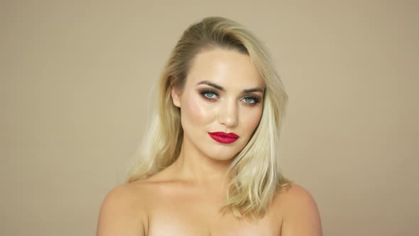 Pretty Blonde Woman with Red Lips